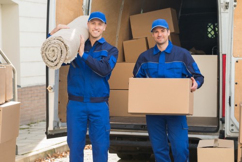 Professional movers handling flat removals in Ilford with stair and access planning