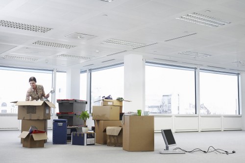 Packed boxes and furniture ready for transport during an Ilford move
